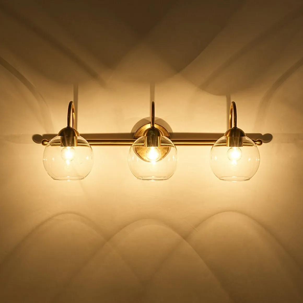 Brass Goose Arm Glass Globe 3-Light Vanity Wall Sconce