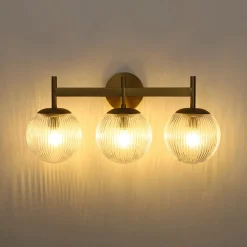 3-Light Brass Ribbed Glass Globe Vanity Wall Sconce
