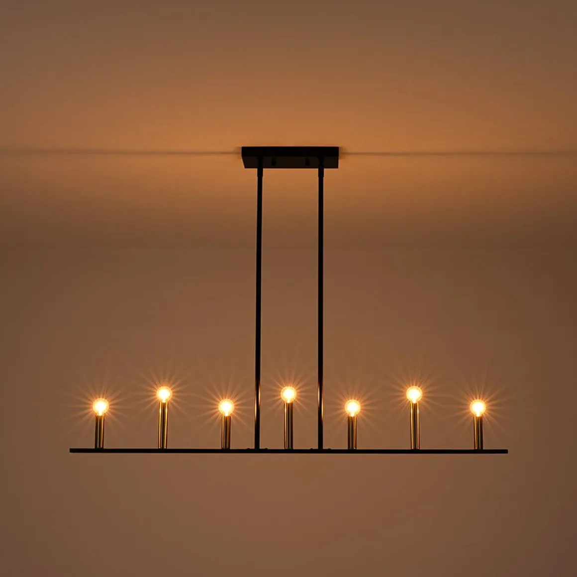 Minimalist Black Brass Candle Style Linear Island Chandelier